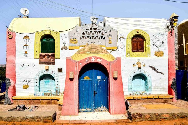 Colorful Nubian house with traditional decorations in the Nubian village of Aswan, Egypt.