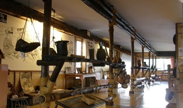 Exhibition of traditional tribal artifacts in Chiang Mai, Thailand, showcasing the cultural heritage of hill tribes.