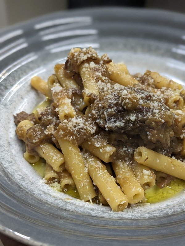 Traditional pasta dish with meat and cheese served at Osteria da Antonio in Naples.
