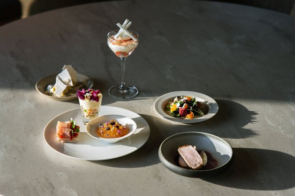 An elegant tasting menu spread of small plates at Don Alfonso 1890 in Sant'Agata sui Due Golfi.