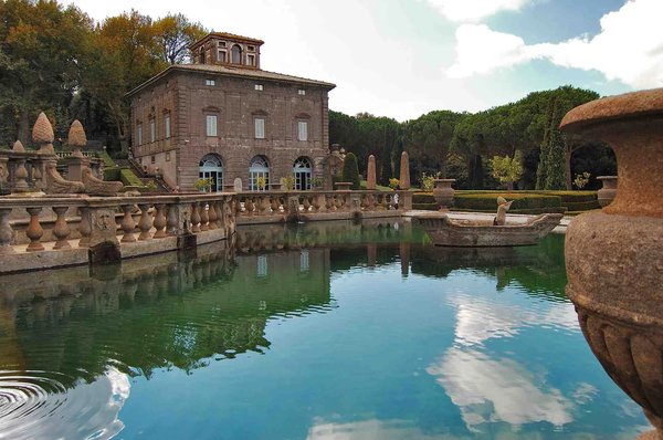 Villa Lante in Viterbo with garden, fountain, and water reflections.