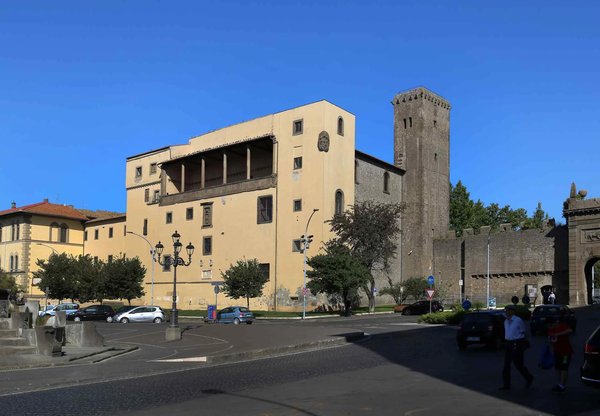 View of Rocca Albornoz in Viterbo with its historic architecture and surrounding square.