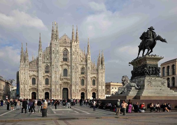 Piazza del Duomo in Milan with the cathedral and the equestrian statue of Vittorio Emanuele II.