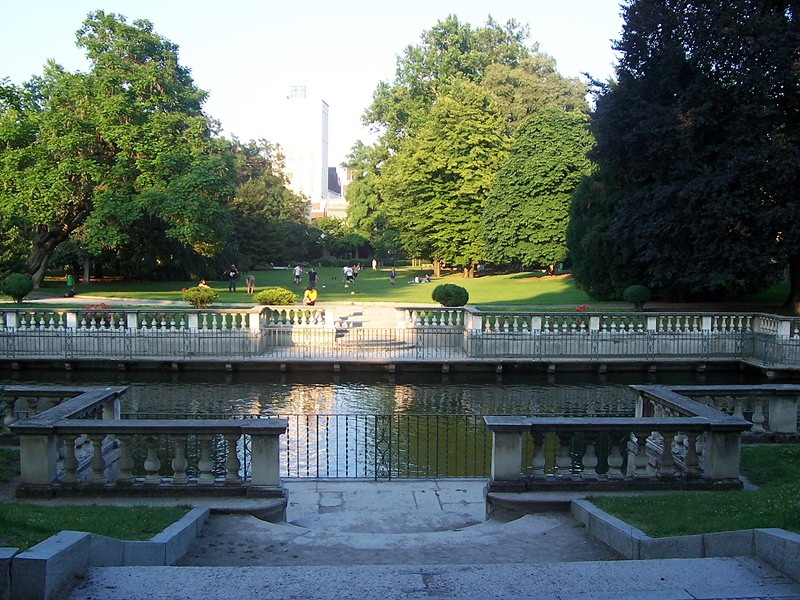 Baroque fish pond flanked by a stone balustrade in the Giardino della Guastalla in Milan.