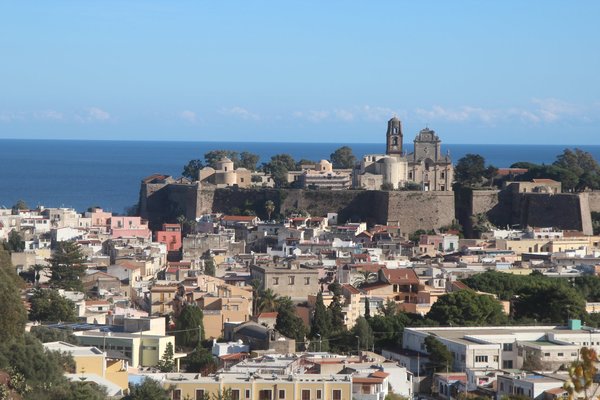 Panoramic view of Lipari's historic center with the castle and sea in the background, Aeolian Islands.