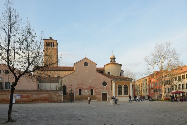 The Chiesa di San Giacomo dell'Orio and its tree-shaded campo in Venice.