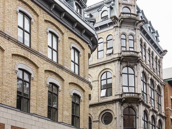 Historic buildings with classic architecture in the Saint-Roch District of Quebec City.